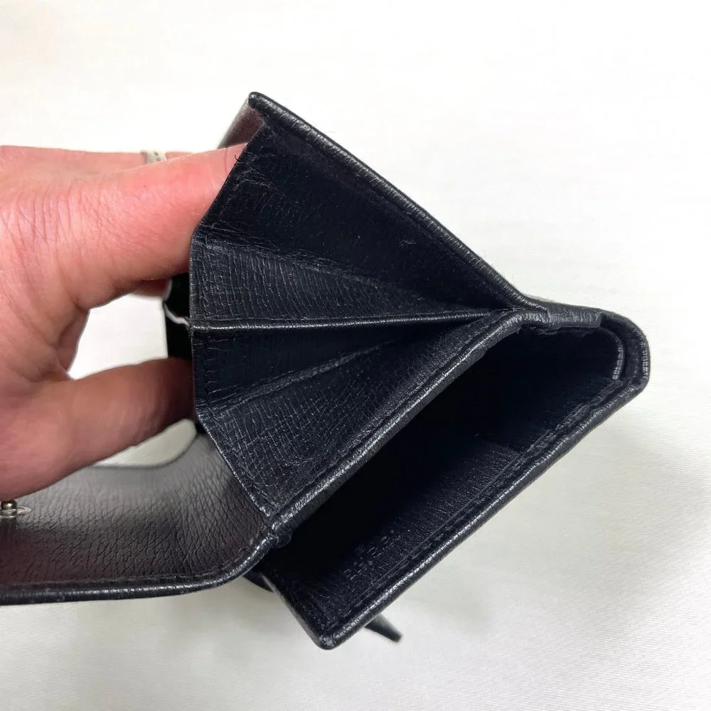 Auc Gucci Snappy Bi-fold GG vintage leather wallet
